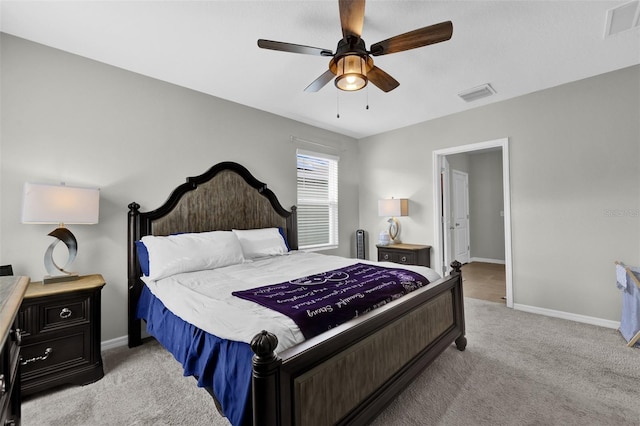 bedroom with a ceiling fan, baseboards, visible vents, and carpet flooring