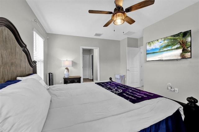 bedroom with visible vents and a ceiling fan