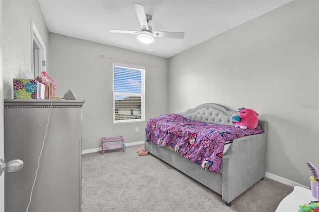 bedroom featuring ceiling fan, carpet floors, and baseboards