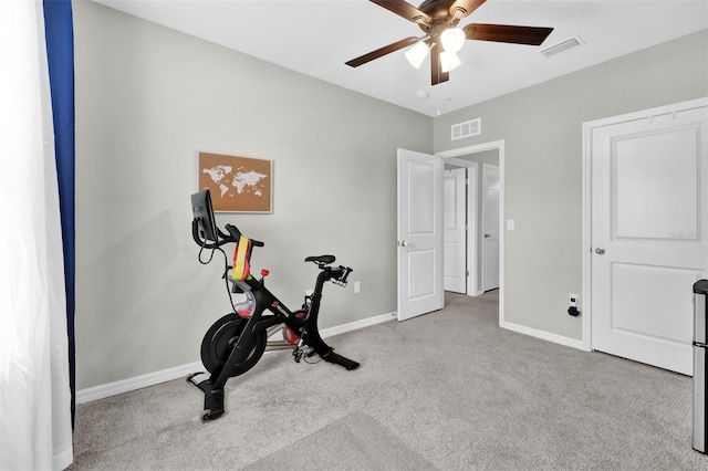 exercise area with a ceiling fan, carpet, visible vents, and baseboards