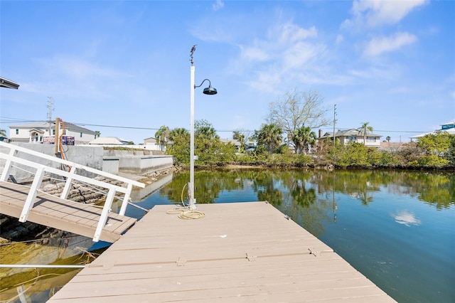 dock area featuring a water view