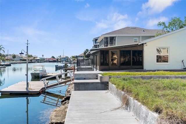 dock area with a water view