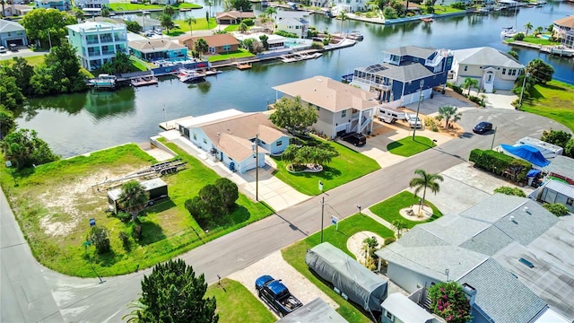 aerial view featuring a residential view and a water view