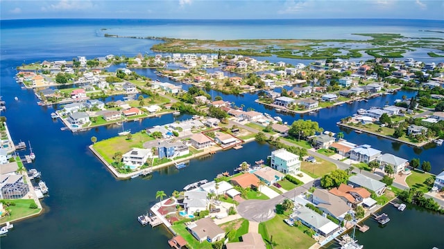 bird's eye view featuring a water view and a residential view