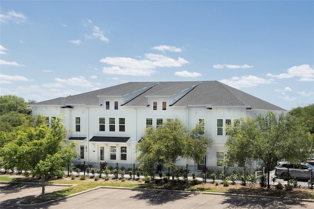 view of property with a fenced front yard