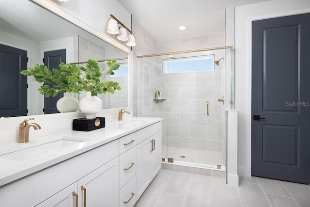 4717 W Mccoy St Unit 18, Tampa, FL 33616 - full bathroom with double vanity, a shower stall, and tile patterned flooring