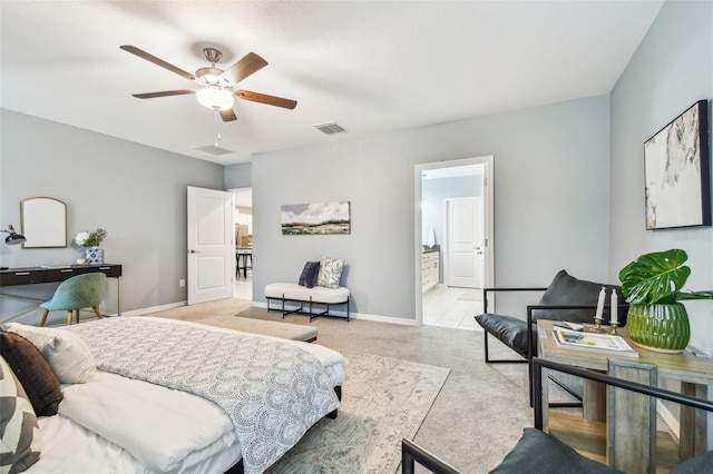 bedroom featuring visible vents, light colored carpet, a ceiling fan, and baseboards