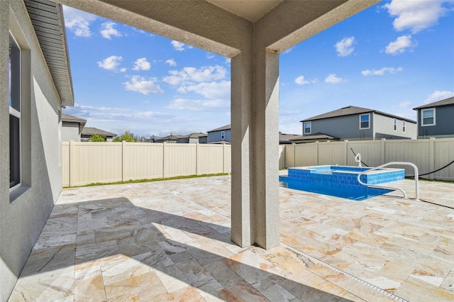 view of patio / terrace with a fenced backyard and a fenced in pool