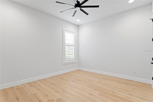 unfurnished room with a ceiling fan, recessed lighting, baseboards, and light wood finished floors