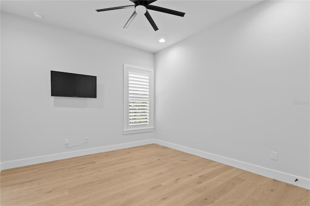 unfurnished room with a ceiling fan, recessed lighting, baseboards, and light wood finished floors