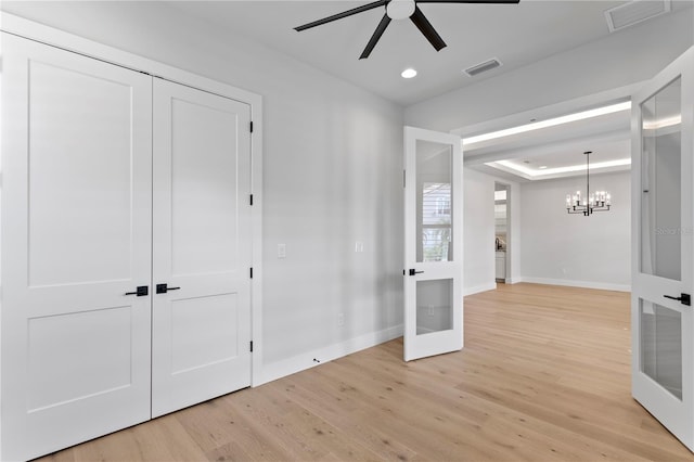 empty room with french doors, visible vents, and light wood-style flooring