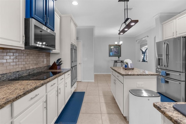 kitchen featuring stainless steel appliances, tasteful backsplash, visible vents, ornamental molding, and light tile patterned flooring