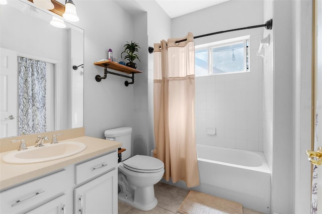 bathroom with toilet, tile patterned floors, shower / bath combo with shower curtain, and vanity