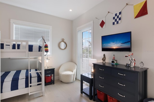 bedroom featuring recessed lighting and light wood-style flooring