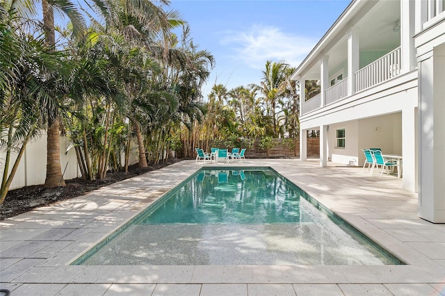 view of pool with a fenced backyard, a patio, and a fenced in pool