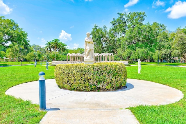 surrounding community featuring a lawn