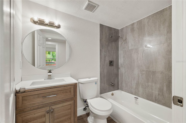 8319 N 14th St, Tampa, FL 33604 - full bath featuring vanity, bathing tub / shower combination, toilet, and a textured ceiling