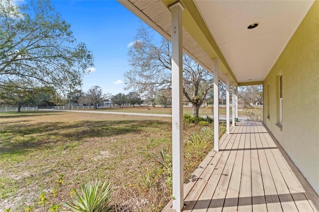 deck featuring a lawn