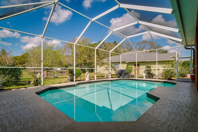 pool featuring a lanai and a patio
