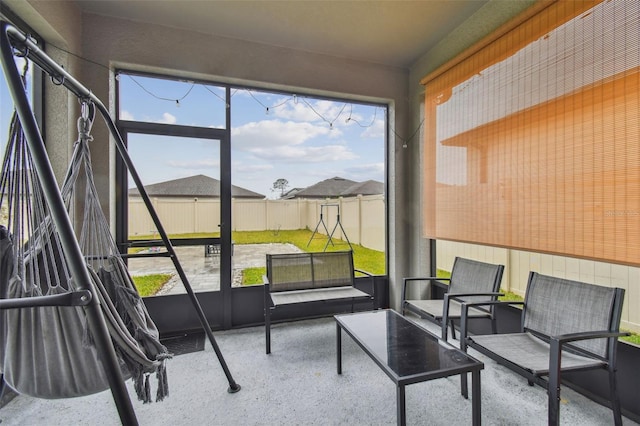 sunroom featuring a healthy amount of sunlight