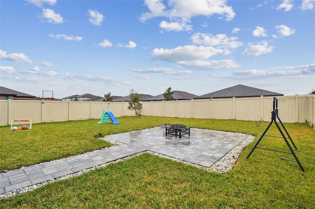 view of yard featuring a fenced backyard and a patio