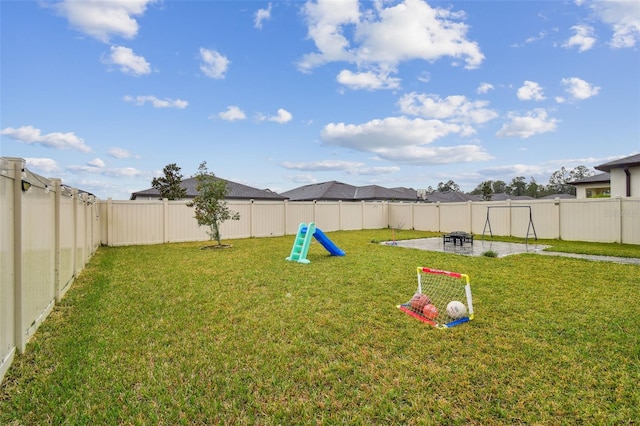 view of yard featuring a patio area and a fenced backyard