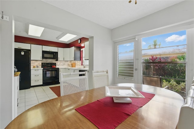 858 Cambridge Ct Unit 858, Dunedin, FL 34698 - dining area featuring light tile patterned flooring