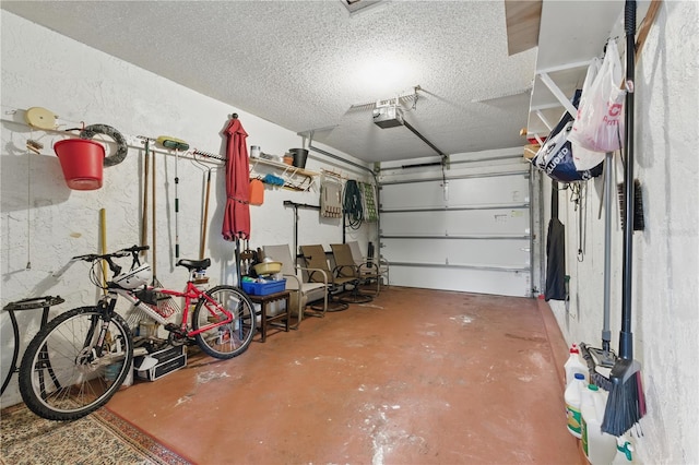 858 Cambridge Ct Unit 858, Dunedin, FL 34698 - garage featuring a garage door opener and a textured wall