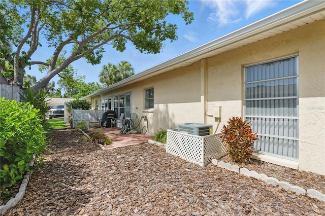 858 Cambridge Ct Unit 858, Dunedin, FL 34698 - view of yard featuring a patio