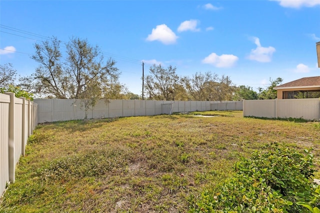 view of yard featuring a fenced backyard