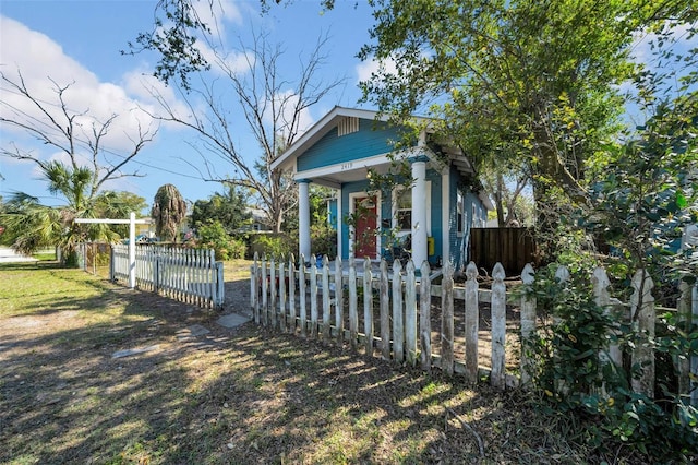 exterior space with a fenced front yard