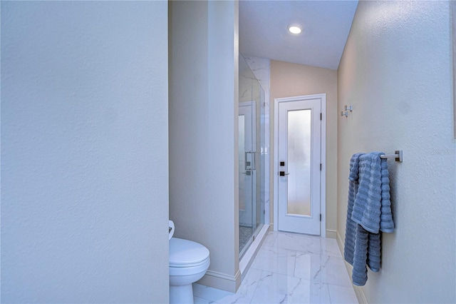 full bath with marble finish floor, baseboards, a shower stall, and toilet