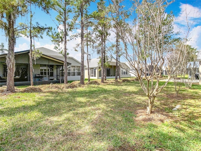 5351 Lookout Pass, Wesley Chapel, FL 33544 - view of yard featuring a sunroom