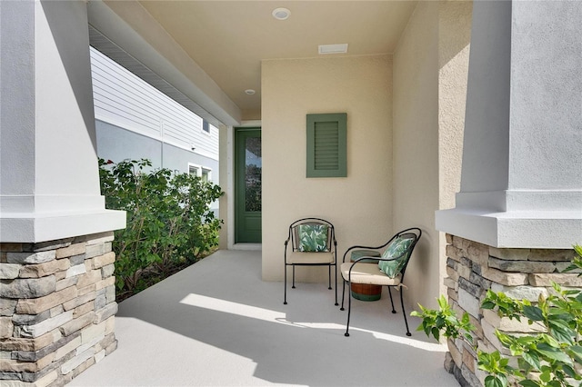 view of patio featuring visible vents