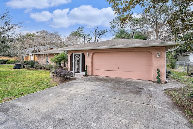 ranch-style home featuring a garage, brick siding, concrete driveway, fence, and a front yard