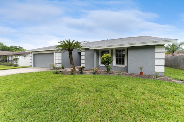 ranch-style home with a garage, driveway, fence, and a front yard