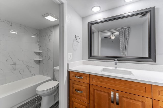 bathroom featuring toilet, shower / washtub combination, visible vents, and vanity