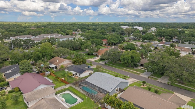 bird's eye view with a residential view and a view of trees