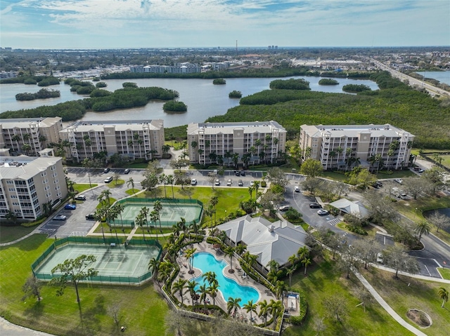 birds eye view of property with a water view