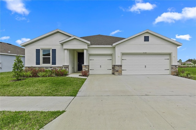 ranch-style house with stone siding, an attached garage, and stucco siding