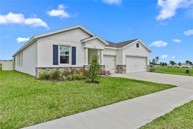 view of front of house with stucco siding, concrete driveway, a front yard, a garage, and stone siding