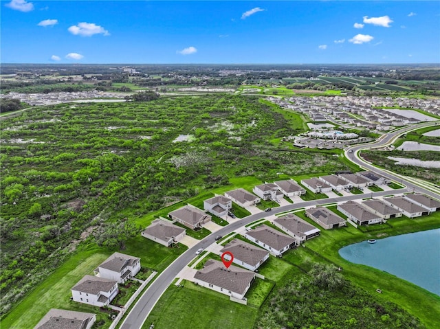 bird's eye view with a water view and a residential view