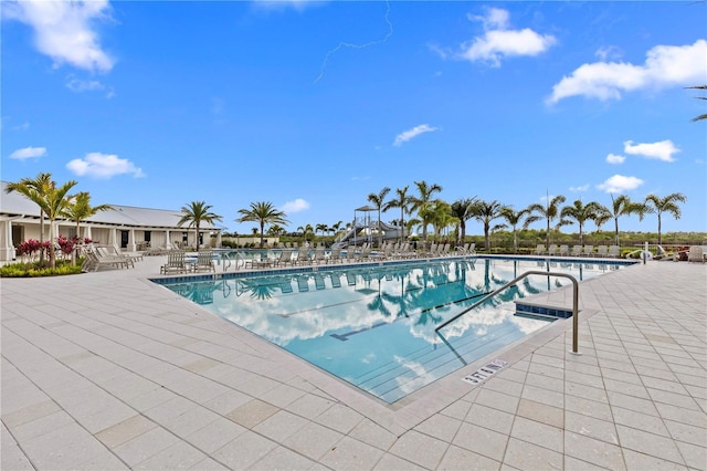 community pool with a patio