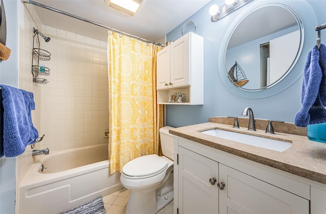 bathroom featuring toilet, vanity, shower / tub combo with curtain, and tile patterned floors