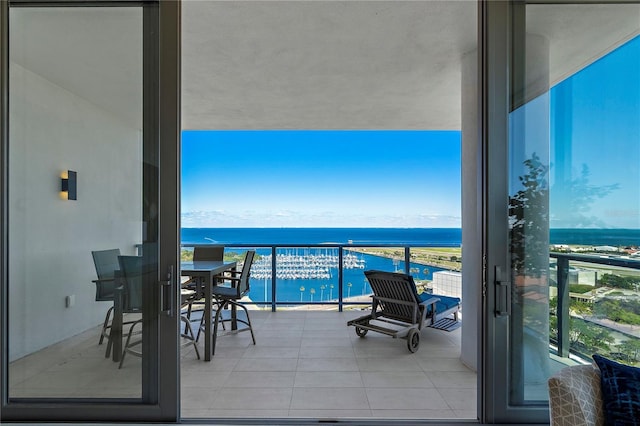 balcony featuring a water view