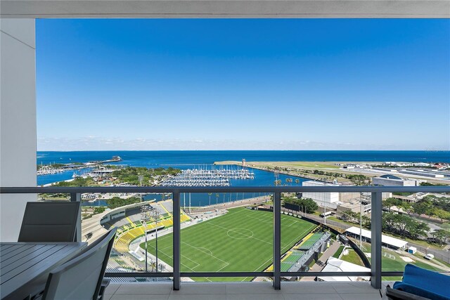 balcony featuring a water view