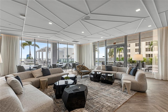 living room with expansive windows and recessed lighting