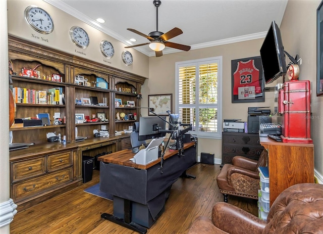 office area featuring a ceiling fan, crown molding, baseboards, and wood finished floors