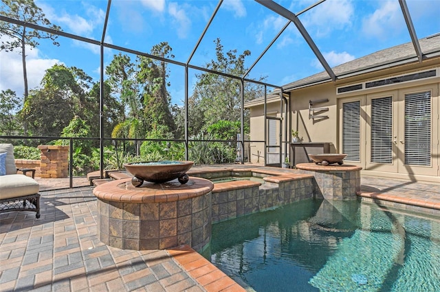 pool with french doors, a patio, and a lanai