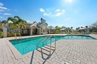 pool with a patio area